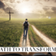 man walking toward the cross with a backpack